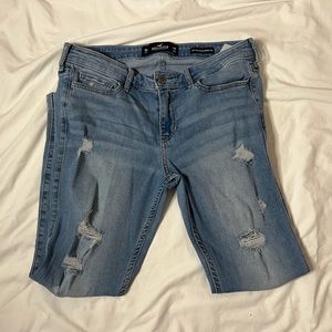Light blue hollister low rise super skinny jeans with rips
